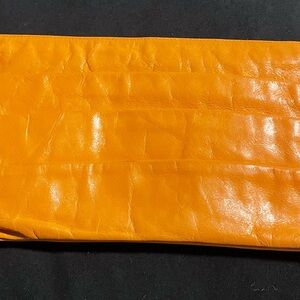 HOBO Orange Leather Clutch